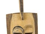 an image of a wooden mask on a white background