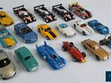 a lot of toy cars that are on the table