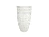 un vase en verre posé sur une surface blanche
