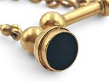 gold plated cufflinks with a black onyxish bead and a chain