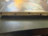 a piece of wood that is sitting on a table