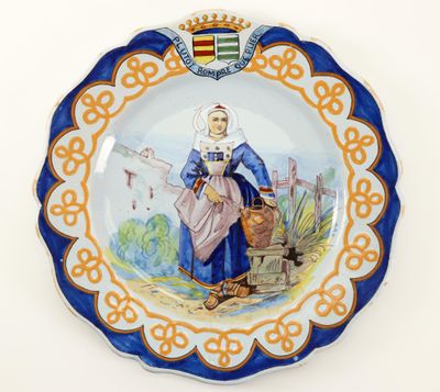 a plate with a picture of a woman holding a basket