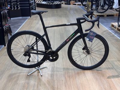 a bike that is sitting on a stand in a store