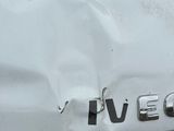 the front end of a white car with the word vego written on it