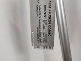 a close up of a metal pole with a tag attached to it