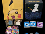 a box of pokemon trading cards and a box of pokemon trading cards