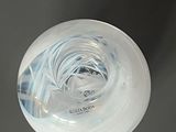 a glass object that is sitting on a table