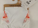 a white underwear that has a pink flower on it