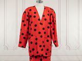 an image of a red and black polka dot dress and jacket
