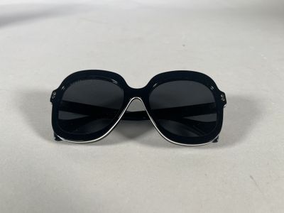 a close up of a pair of sunglasses on a table