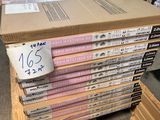 a lot of dvds stacked on top of each other