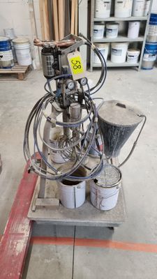 a machine that is sitting on a pallet in a warehouse