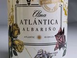 a bottle of wine that has a picture of a ship on it