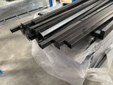 many pieces of metal that are sitting on a pallet