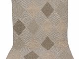 a brown and white rug with a diamond pattern on it