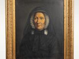 un tableau représentant une femme en robe noire et coiffe