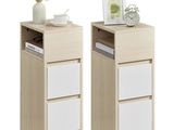 pair of bedside tables with drawers and a picture frame on top