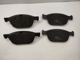 three pairs of black glasses sitting on top of a white table