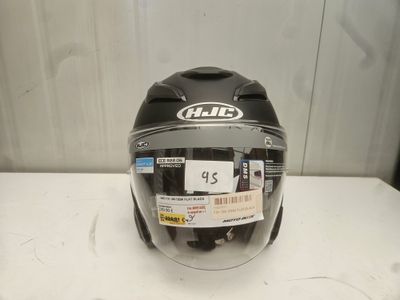 an image of a helmet with a sticker on it sitting on a table