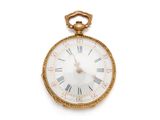 une montre de poche en or avec des chiffres romains sur le cadran