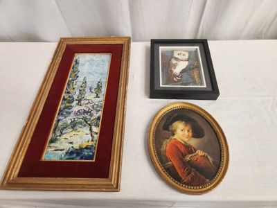 two framed pictures of a boy in a red coat and a picture of a boy in a red coat