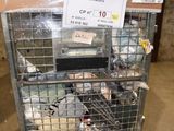a metal cart with a lot of items in it