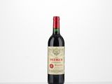 a bottle of red wine sitting on top of a table