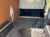 the inside of a van with the door open showing the interior