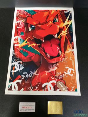 a close up of a picture of a red dragon on a table