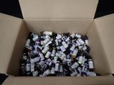 a cardboard box filled with lots of bottles of alcohol