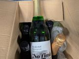 bottles of wine in a cardboard box filled with bottles of wine