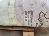 a large bag of food sitting on top of a wooden pallet