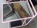 a table that has a mirror on top of it