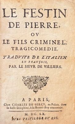 un vieux livre sur lequel figurent des inscriptions et une illustration du titre