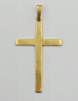 pendentif en forme de croix en or sur fond blanc