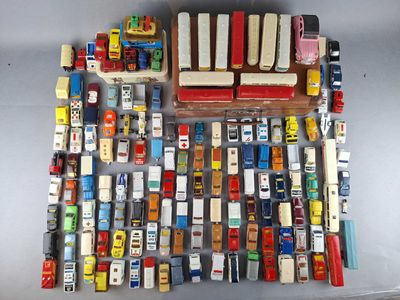 a lot of toy cars that are on the table