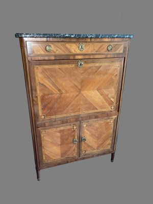 an image of a wooden cabinet with marble top and drawers