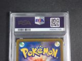 a close up of a pokemon card on a table
