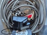 a box with hoses and a water pump in it
