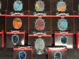 a lot of different colored stones on display in a store