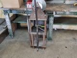 a workbench with tools on it in a garage
