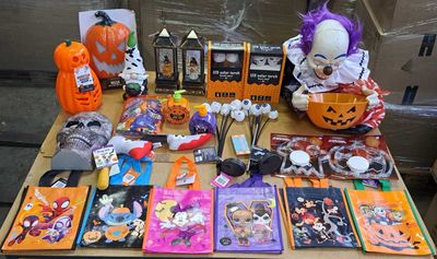 a table with a lot of halloween items on it