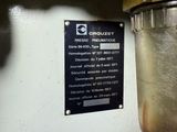 a close up of a water heater with a sign on it