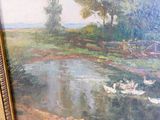 a picture of a painting of ducks in a pond