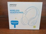 a box with a pair of headphones in it sitting on a table
