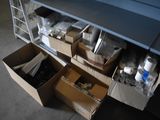 many boxes that are sitting on the floor next to each other