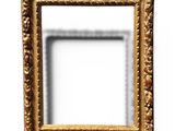 a close up of a gold frame on a white wall