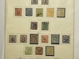 an image of a picture of a collection of stamps on a wall