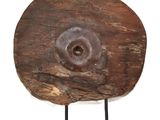 a large piece of wood with a hole in it