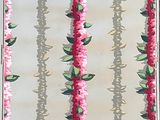 a picture of a bathroom with pink flowers on the shower curtain